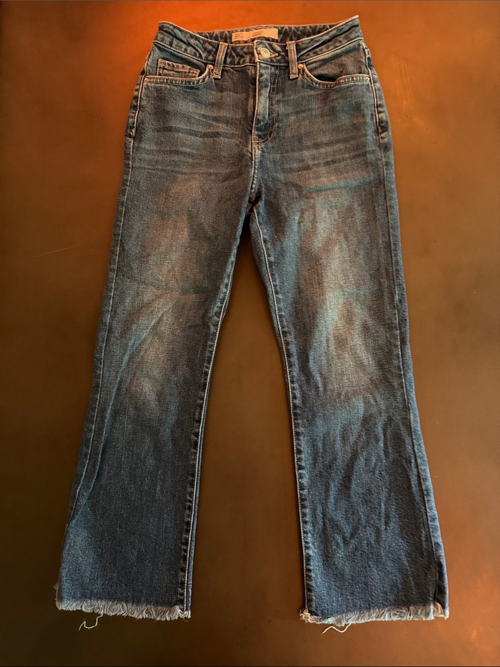 Topshop Medium Wash Bootcut Jeans with Raw Hem